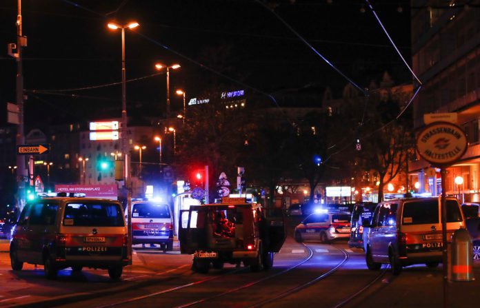 Image: Police blocks a street near Schwedenplatz square after a shooting in Vienna