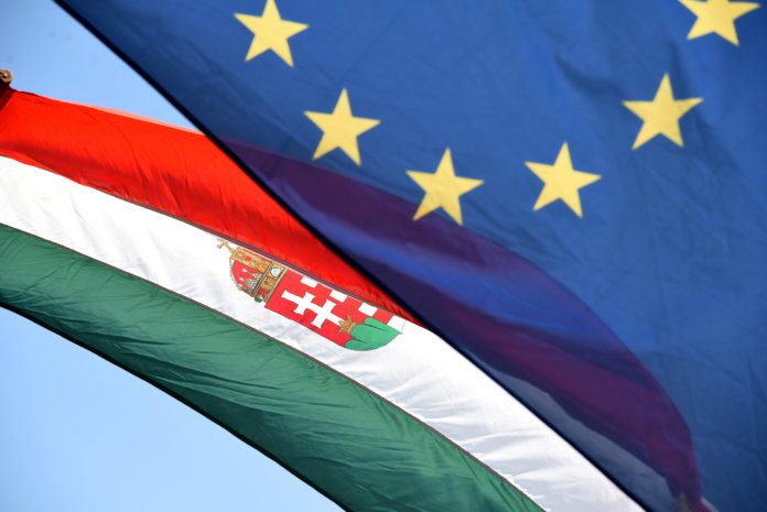 Eu,And,Hungary,Flags,Together,In,Wind.